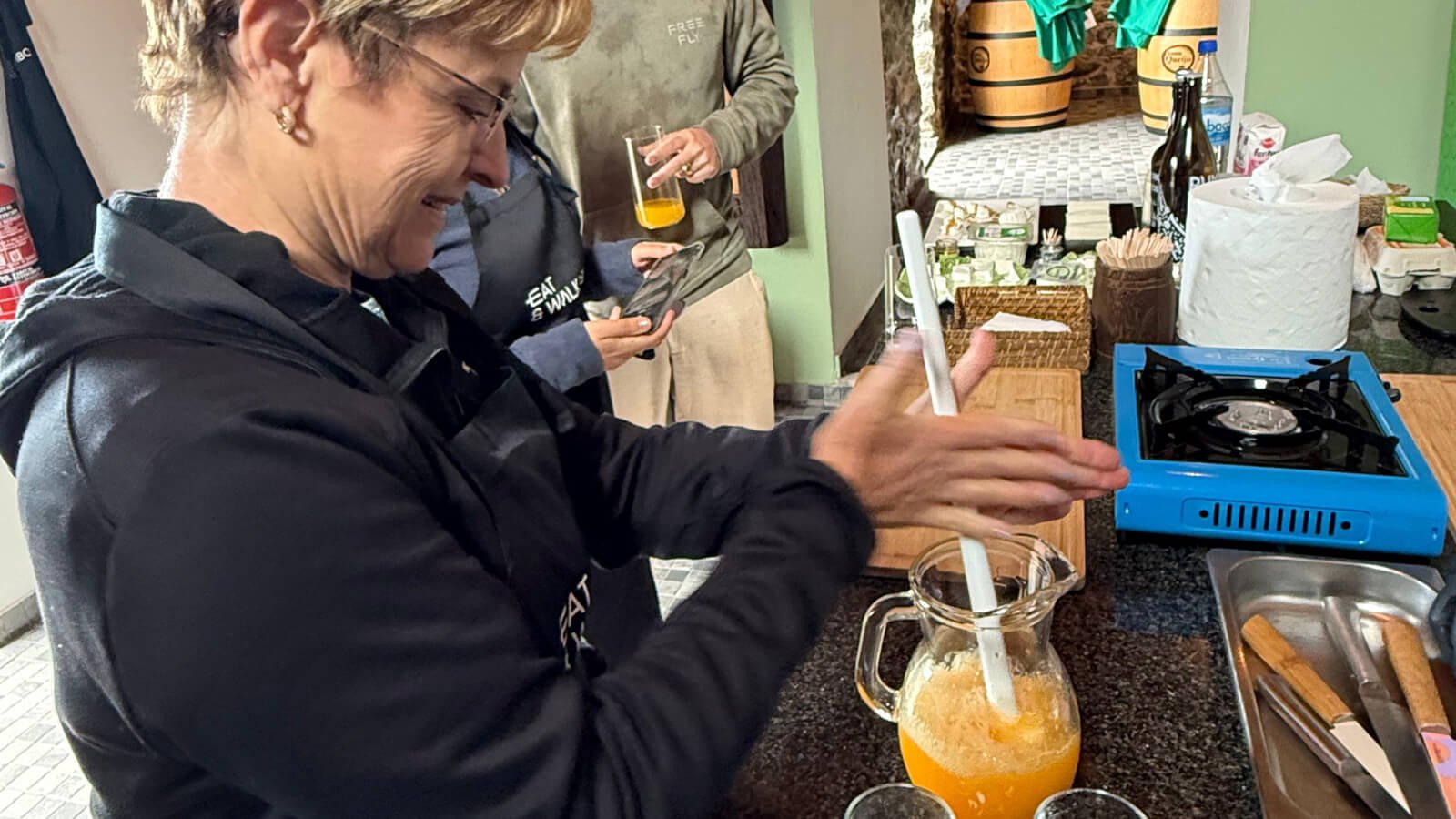 Chef Sergio preparing traditional Madeira poncha during the Santo da Serra cooking livestream