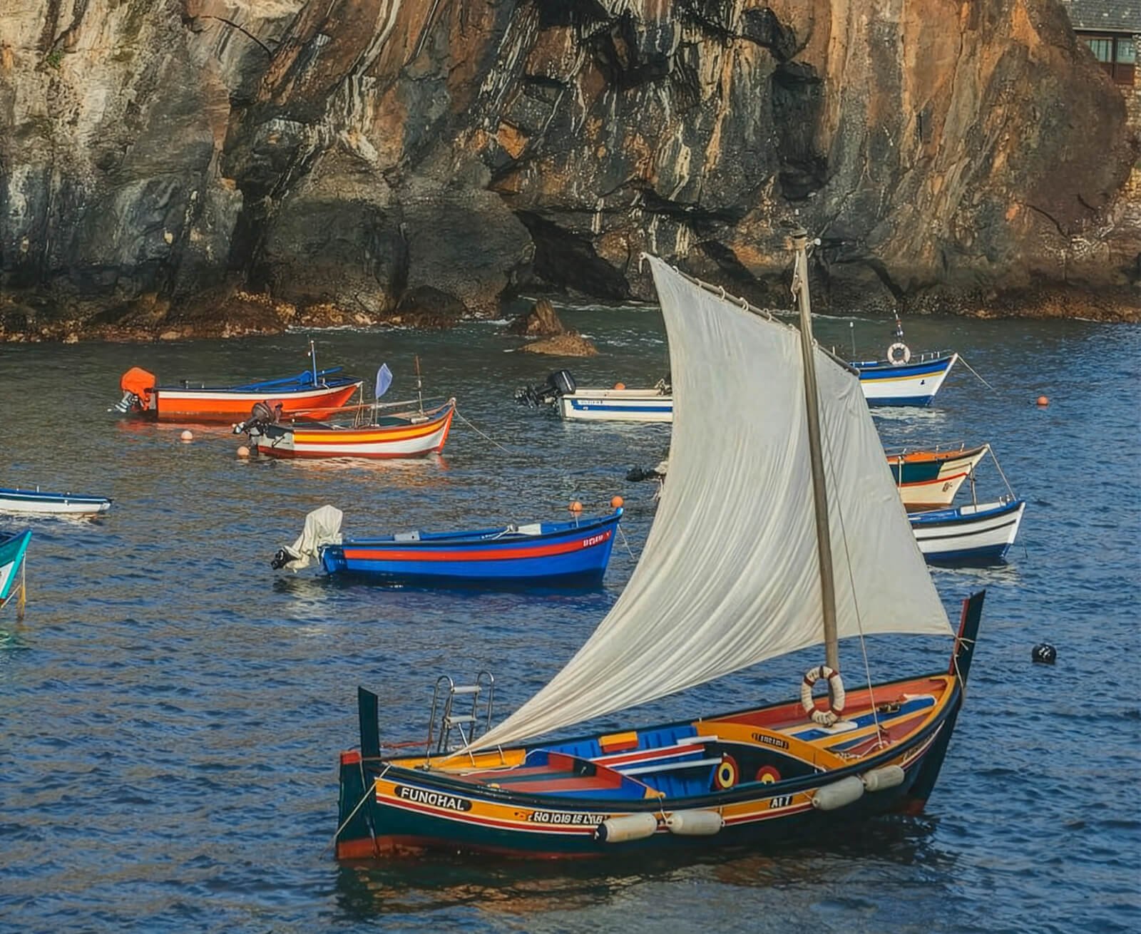 Colourful traditional Xavelha boat in Camara de Lobos Madeira