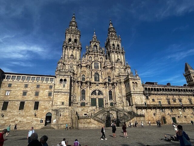 Historic cathedral façade under blue skies along the Camino de Santiago route.